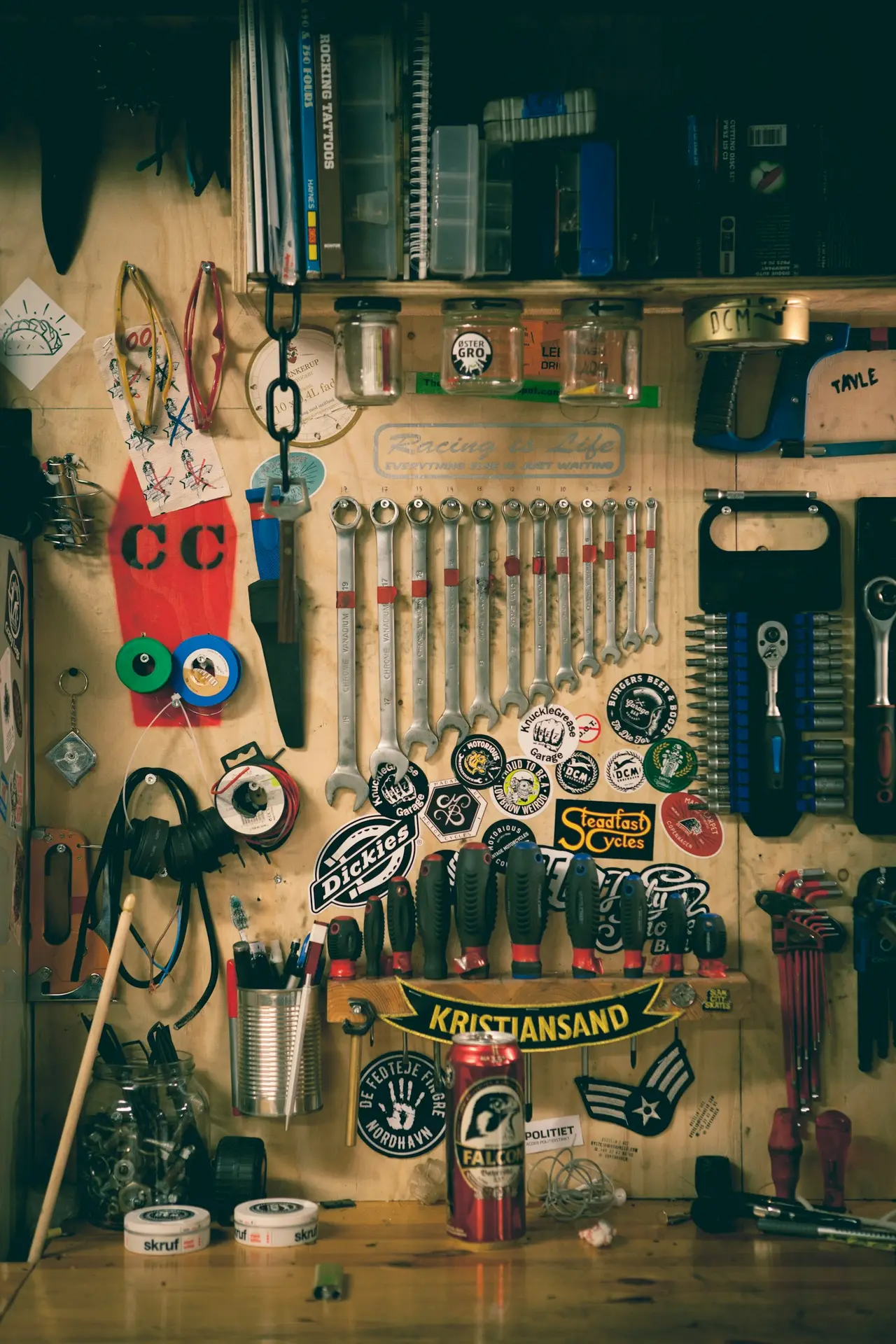 An assortment of hand tools laid out together.